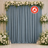 Floral wedding backdrop with blue curtains and white roses, flame retardant