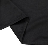 Black ribbed knit fabric close-up with folded seam detail