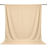 Beige seamless photography backdrop curtain on studio stand