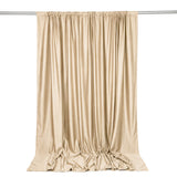 Beige satin curtain draped on rod, elegant floor-length window panel