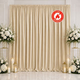 Elegant ivory curtain backdrop with white floral arrangements and candles, flame retardant