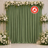 Elegant green wedding backdrop with white flowers and flame retardant sign