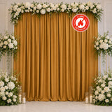 Gold curtain floral wedding backdrop with white roses and candles