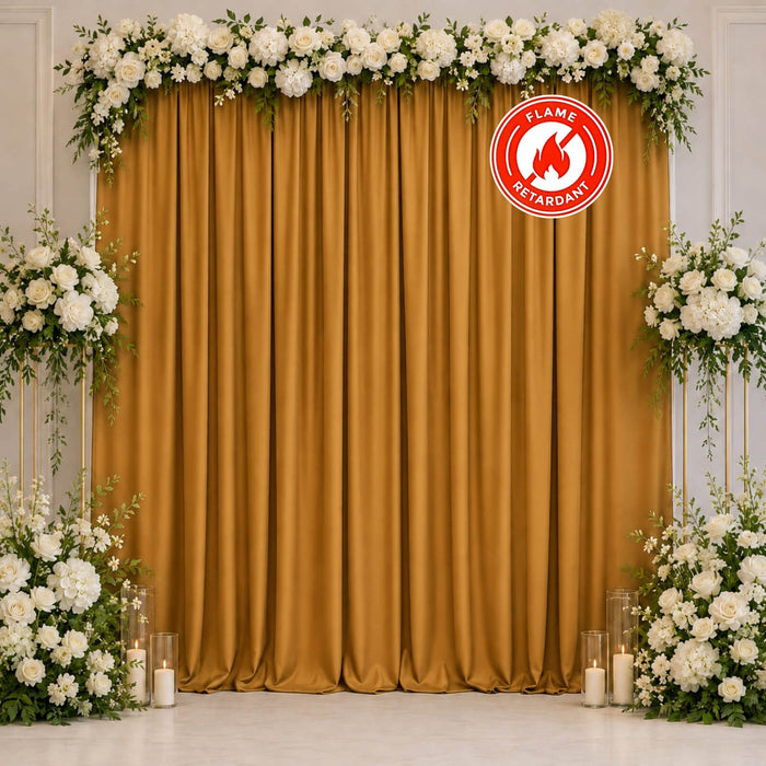 Gold curtain floral wedding backdrop with white roses and candles