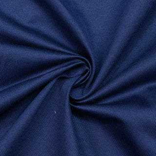Navy blue ribbed fabric texture with soft folded swirl pattern#whtbkgd