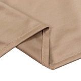 Beige ribbed knit fabric close-up with folded hem detail