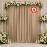 Elegant floral wedding backdrop with white roses and beige drapes, flame retardant