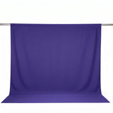 Purple seamless photography backdrop on support stand