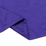 Purple ribbed fabric close-up with stitched hem and folded corner