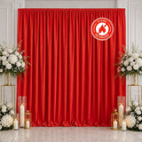 Red flame retardant curtain backdrop with floral wedding decor and candles