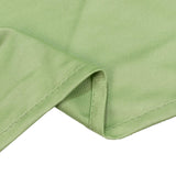 Light green ribbed knit fabric close-up with folded edge