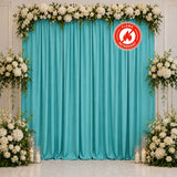 Elegant turquoise wedding backdrop with white flowers and candles, flame retardant