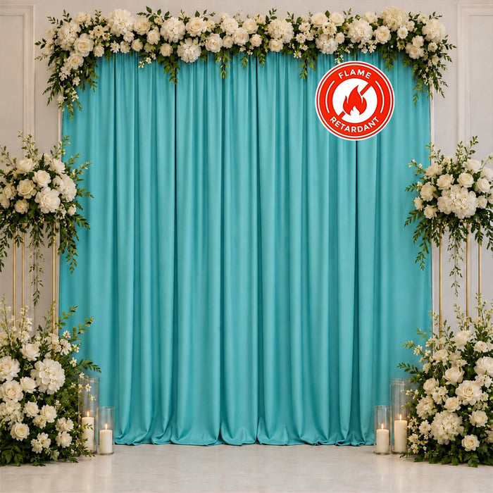 Elegant turquoise wedding backdrop with white flowers and candles, flame retardant