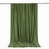 Olive green satin curtain panel hanging on rod