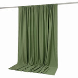 Olive green curtain draped on a rod against a white background