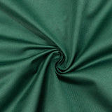 Green ribbed fabric texture swirl close-up background