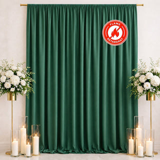 Green flame retardant curtain backdrop with floral stands and candles