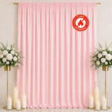 Pink flame retardant curtain backdrop with floral stands and candles