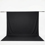 Black photography backdrop with seamless floor and support rod#whtbkgd