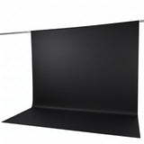 Black seamless paper backdrop on support rod, studio photography background