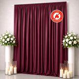 Burgundy flame-retardant curtain with floral decor and candles on each side