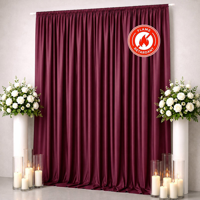 Burgundy flame-retardant curtain with floral decor and candles on each side