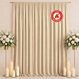 Beige flame-retardant curtain backdrop with floral stands and candles