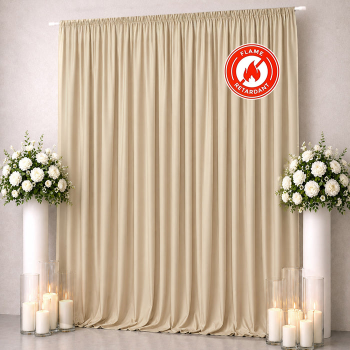 Beige flame retardant curtain backdrop with floral arrangements and candles