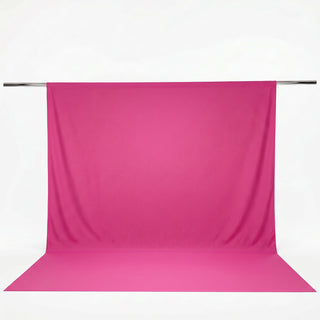 Pink photo backdrop with seamless floor and hanging support rod#whtbkgd