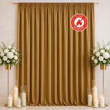 Gold flame-retardant curtain with white floral arrangements and candles