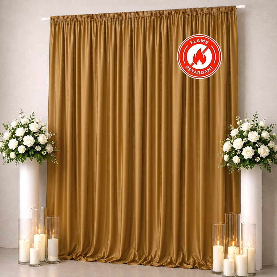 Gold flame-retardant curtain backdrop with white floral arrangements and candles