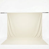 Beige seamless photography backdrop with support rod on white background#whtbkgd