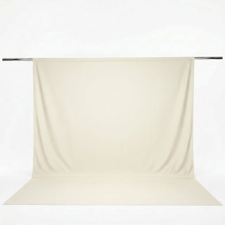 Beige seamless photography backdrop with support rod on white background#whtbkgd