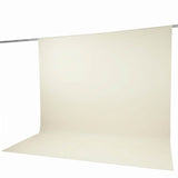 Cream seamless paper backdrop hanging on a photography backdrop stand