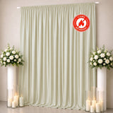 Ivory flame retardant curtain backdrop with floral candles and white roses