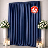Navy blue flame retardant curtain with floral wedding decor and candles