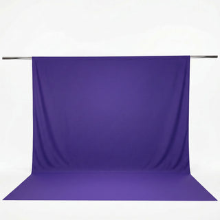 Purple fabric backdrop on a hanging rod with floor extension#whtbkgd