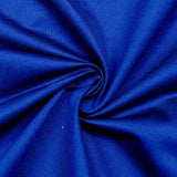 Close-up of bright blue ribbed fabric with gathered folds