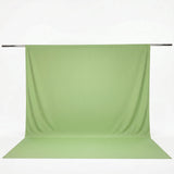 Light green fabric backdrop with seamless floor and support rod#whtbkgd