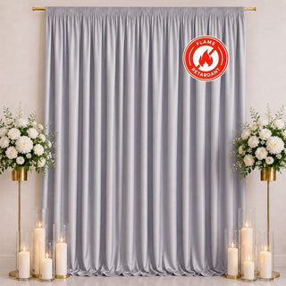 Silver flame retardant curtain with floral decor and candles backdrop