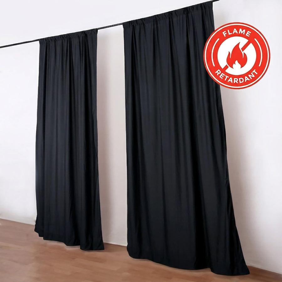 Black flame retardant curtains on a curtain rod in a modern room