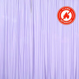 Flame retardant purple curtain draped elegantly in studio setting. #whtbkgd