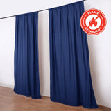 Blue flame-retardant curtain panels on rod with fire safety badge