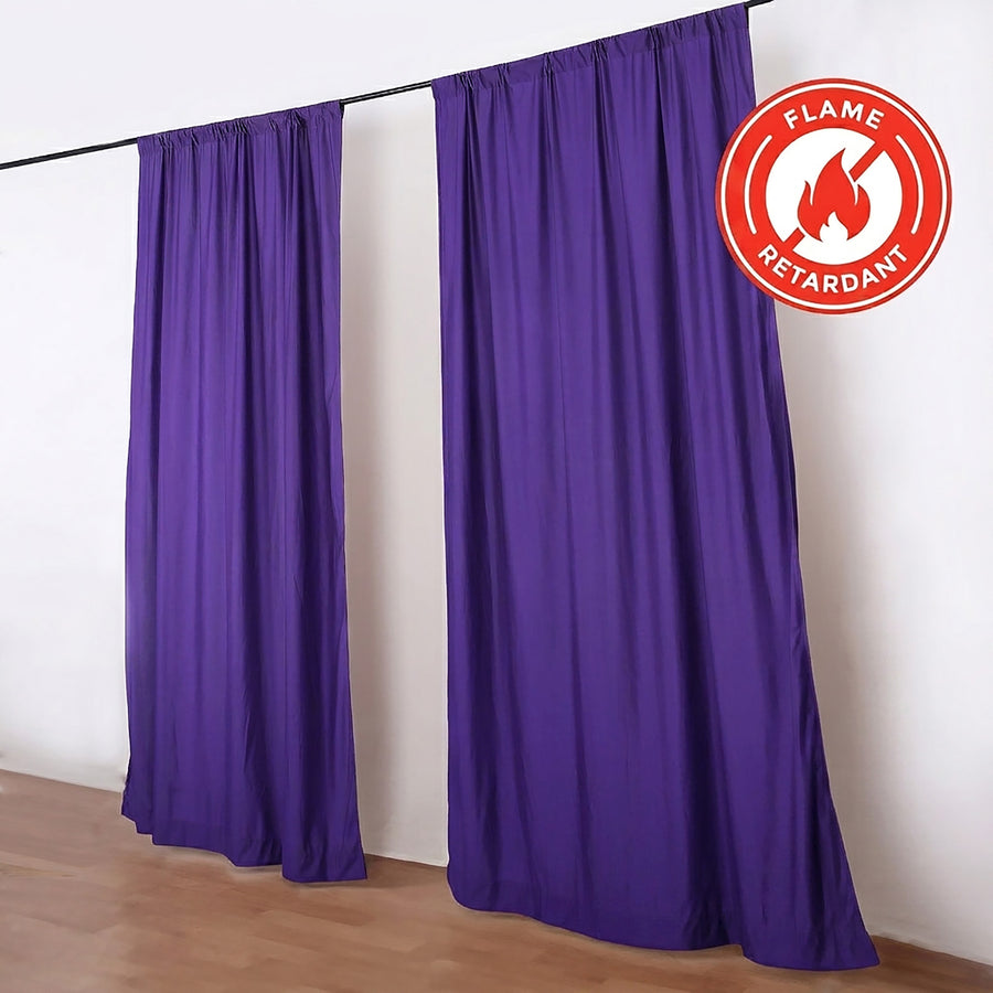Purple flame retardant curtains on wall-mounted rod in room interior