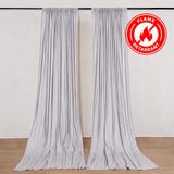 Flame retardant silver curtains on wall-mounted rod in neutral room