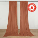 Flame retardant rust curtains hanging on wall in modern interior