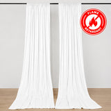 White flame-retardant curtains hanging on a rod in a modern room
