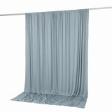 Light blue draped backdrop curtain on a rod for photography studio use