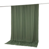 Olive green draped curtain backdrop on hanging rod