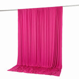 Bright pink draped fabric backdrop on a silver rod, studio isolated on white